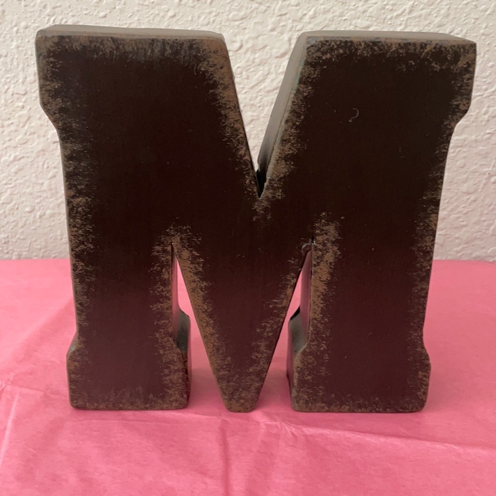 Metal M brown metal